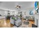 Spacious living area open to the kitchen with hardwood floors and modern decor at 1525 Harriman St, Mount Pleasant, SC 29466