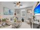 This living room boasts comfortable seating, stylish décor, and a mounted flatscreen TV at 1525 Harriman St, Mount Pleasant, SC 29466