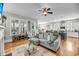 Open-concept living space with hardwood floors and comfortable furniture at 1525 Harriman St, Mount Pleasant, SC 29466