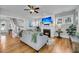 Bright living room featuring a fireplace, hardwood floors, and stylish furnishings at 1525 Harriman St, Mount Pleasant, SC 29466