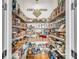 Walk-in pantry featuring organized shelving, maximizing storage space for groceries and household items with ample shelving at 1525 Harriman St, Mount Pleasant, SC 29466