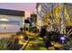 Pathway leading to home with stone path, landscape lighting, and a neatly landscaped garden, enhancing curb appeal at 1525 Harriman St, Mount Pleasant, SC 29466