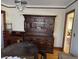 Traditional dining room with dark wood furniture and ornate chandelier at 161 Gordon Street, Charleston, SC 29403