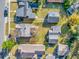 An aerial view showcasing the property and its neat surroundings with well-placed homes in a community setting at 2120 Thornlee Dr, North Charleston, SC 29405