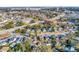 An aerial shot of homes in a quiet neighborhood featuring tree-lined streets with easy access to downtown at 2120 Thornlee Dr, North Charleston, SC 29405