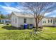Backyard showcasing well-maintained lawn, utility access, and a classic design matching the neighborhood aesthetic at 2120 Thornlee Dr, North Charleston, SC 29405