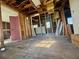 The interior of the house includes wooden framing and construction debris at 2120 Thornlee Dr, North Charleston, SC 29405