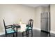 Kitchen area with a dining table and chairs and stainless steel fridge at 2120 Thornlee Dr, North Charleston, SC 29405