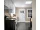 Charming kitchen with white cabinets and modern appliances at 2120 Thornlee Dr, North Charleston, SC 29405