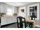 Bright kitchen with white cabinets, sleek countertops, and natural light at 2120 Thornlee Dr, North Charleston, SC 29405