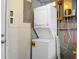 Laundry area featuring a stacked washer and dryer, plus utility connections at 2120 Thornlee Dr, North Charleston, SC 29405