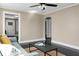 Open living room with hardwood floors and a view of the front door at 2120 Thornlee Dr, North Charleston, SC 29405