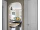 Bright living room with sleek dark floors, inviting furniture, and a glimpse of the open layout at 2120 Thornlee Dr, North Charleston, SC 29405