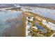 Expansive aerial view showcasing townhouses near meandering waterways and lush coastal greenery at 2135 Tides End Rd, Charleston, SC 29412
