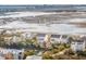 Elevated scene of modern marsh view townhouses, complemented by a mix of nature and neighborhood serenity at 2135 Tides End Rd, Charleston, SC 29412