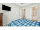 Bedroom has a full sized bed, TV, and an attached bathroom at 2135 Tides End Rd, Charleston, SC 29412