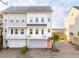 Coastal townhome featuring a private balcony and modern finishes, perfect for enjoying waterfront living at 2135 Tides End Rd, Charleston, SC 29412