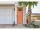 Charming front entrance featuring a vibrant door, adding a splash of color to the home's exterior at 2135 Tides End Rd, Charleston, SC 29412