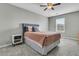 Comfortable bedroom with neutral walls, carpet, ceiling fan, and large window at 219 Daybreak Blvd, Summerville, SC 29486