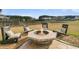 Cozy backyard fire pit area with comfortable seating and scenic views at 219 Daybreak Blvd, Summerville, SC 29486