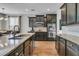 Gourmet kitchen with a central island, stainless steel appliances, and granite countertops, perfect for cooking and entertaining at 219 Daybreak Blvd, Summerville, SC 29486