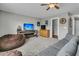 Cozy living room featuring a large sectional, beanbag chairs, and hardwood cabinet at 219 Daybreak Blvd, Summerville, SC 29486