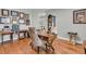Comfortable office space with hardwood floors, a sewing desk, and a wooden desk with a patterned chair at 219 Daybreak Blvd, Summerville, SC 29486