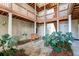 Exterior courtyard featuring a bench, stone pavers, beautiful greenery, and walkways leading to units at 2434 Egret Crest Ln, Charleston, SC 29414