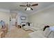 Comfortable living room with a fireplace, TV, and plush sectional sofa at 2434 Egret Crest Ln, Charleston, SC 29414