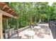 Outdoor grill with seating and stone fireplace providing a welcoming area for outdoor gatherings and culinary experiences at 2434 Egret Crest Ln, Charleston, SC 29414