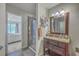 Cozy bathroom including a modern sink with framed mirror and a glass shower room at 2765 Jobee Dr # 1303, Charleston, SC 29414