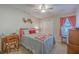 Comfortable bedroom featuring a ceiling fan, closet, and a window providing natural light at 2765 Jobee Dr # 1303, Charleston, SC 29414