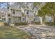 Attractive townhomes with private parking and mature landscaping for added curb appeal at 2765 Jobee Dr # 1303, Charleston, SC 29414