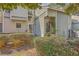 Charming townhome exterior with verdant shrubs and mature landscaping near the entrance at 2765 Jobee Dr # 1303, Charleston, SC 29414