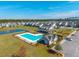 Aerial view of community pool, clubhouse and surrounding homes; resort-style living at 286 Godwit Dr, Summerville, SC 29486