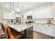 Spacious kitchen with white cabinets, granite countertops, stainless steel appliances, and a center island at 286 Godwit Dr, Summerville, SC 29486