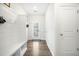 Inviting mudroom features a bench with storage, hooks, and a view to the home's exterior at 286 Godwit Dr, Summerville, SC 29486