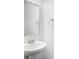Clean bathroom with a white vanity and a framed mirror at 294 Torslanda Ln, Summerville, SC 29486
