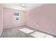 Pink bedroom with a ceiling fan and great natural light at 294 Torslanda Ln, Summerville, SC 29486
