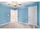 Light blue bedroom with a view of a doorway leading to another room at 294 Torslanda Ln, Summerville, SC 29486