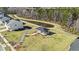 View from above showcases a neighborhood pond with a gazebo and sidewalk nearby at 294 Torslanda Ln, Summerville, SC 29486
