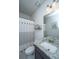 Well-lit bathroom with a granite vanity, a shower with patterned curtain, and stylish decorative elements at 312 Coki Amalie Ct, Charleston, SC 29492