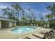 Refreshing community pool with lounge chairs and manicured landscaping, offering a resort-like experience at 312 Coki Amalie Ct, Charleston, SC 29492