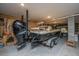 Spacious garage with boat on a trailer, tools, and storage shelves, perfect for hobbyists and water enthusiasts at 312 Coki Amalie Ct, Charleston, SC 29492