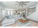 Open floor plan featuring a comfortable living area that flows into the kitchen and dining space at 312 Coki Amalie Ct, Charleston, SC 29492