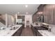 Modern kitchen with stainless steel appliances, granite countertops, tile backsplash, and ample cabinet space for a chef's dream at 332 Calm Water Way, Summerville, SC 29486