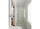 Modern bathroom featuring a glass-enclosed shower with tile accents and fixtures at 34 Anson St, Charleston, SC 29401