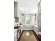 Well-lit kitchen features stainless steel appliances and lots of storage at 34 Anson St, Charleston, SC 29401