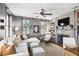Inviting living room with fireplace, bookshelves, and abundant natural light at 34 Anson St, Charleston, SC 29401