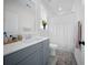 Bathroom featuring a sink, toilet, and shower with neutral decor and natural light at 3785 Summerton St, Mount Pleasant, SC 29466
